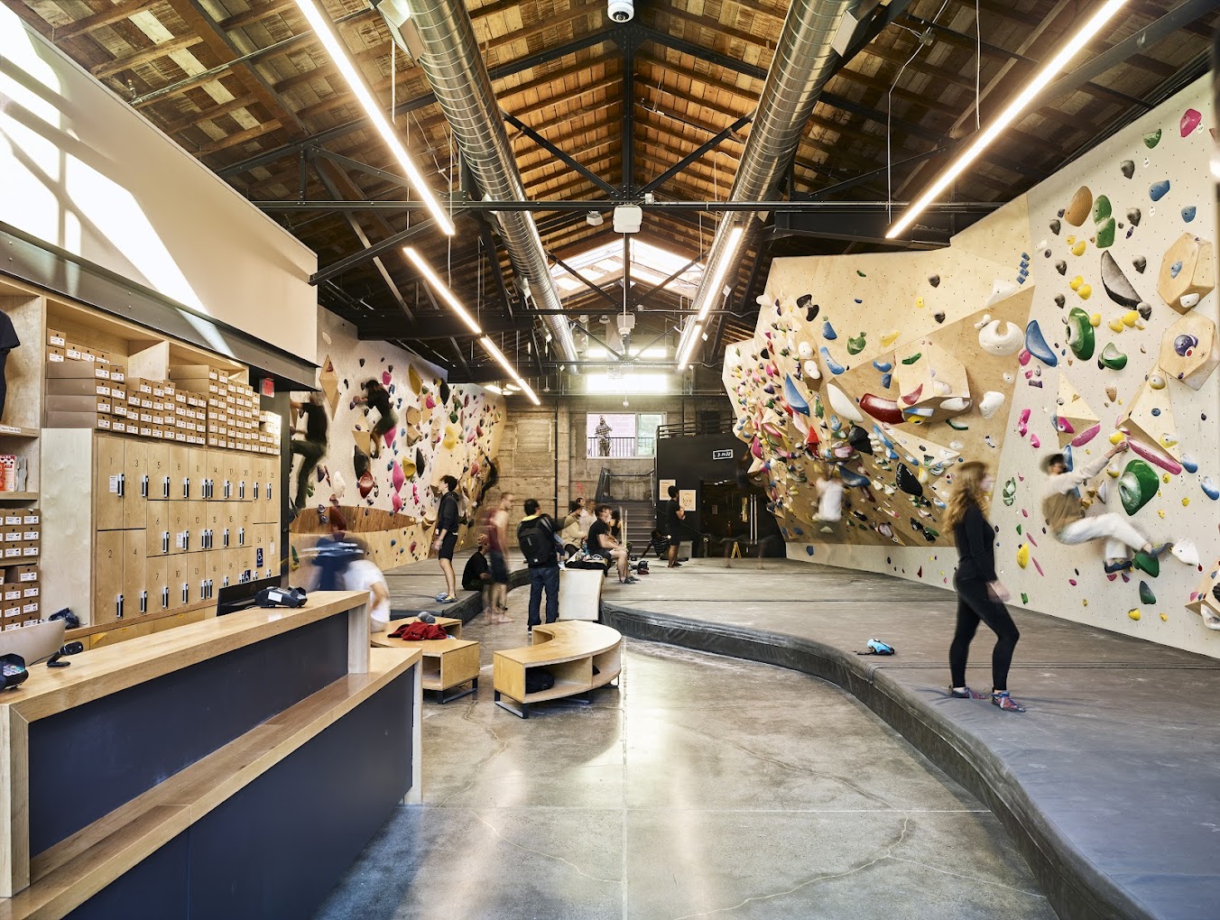 Friends climbing and hanging out at Mosaic Boulders
